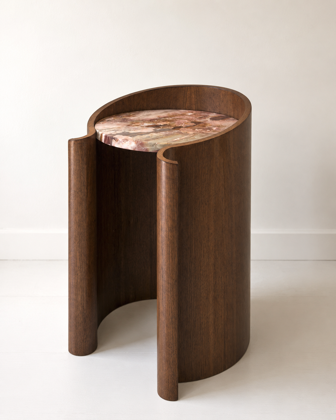 curved wood veneer side table in walnut with a marble top