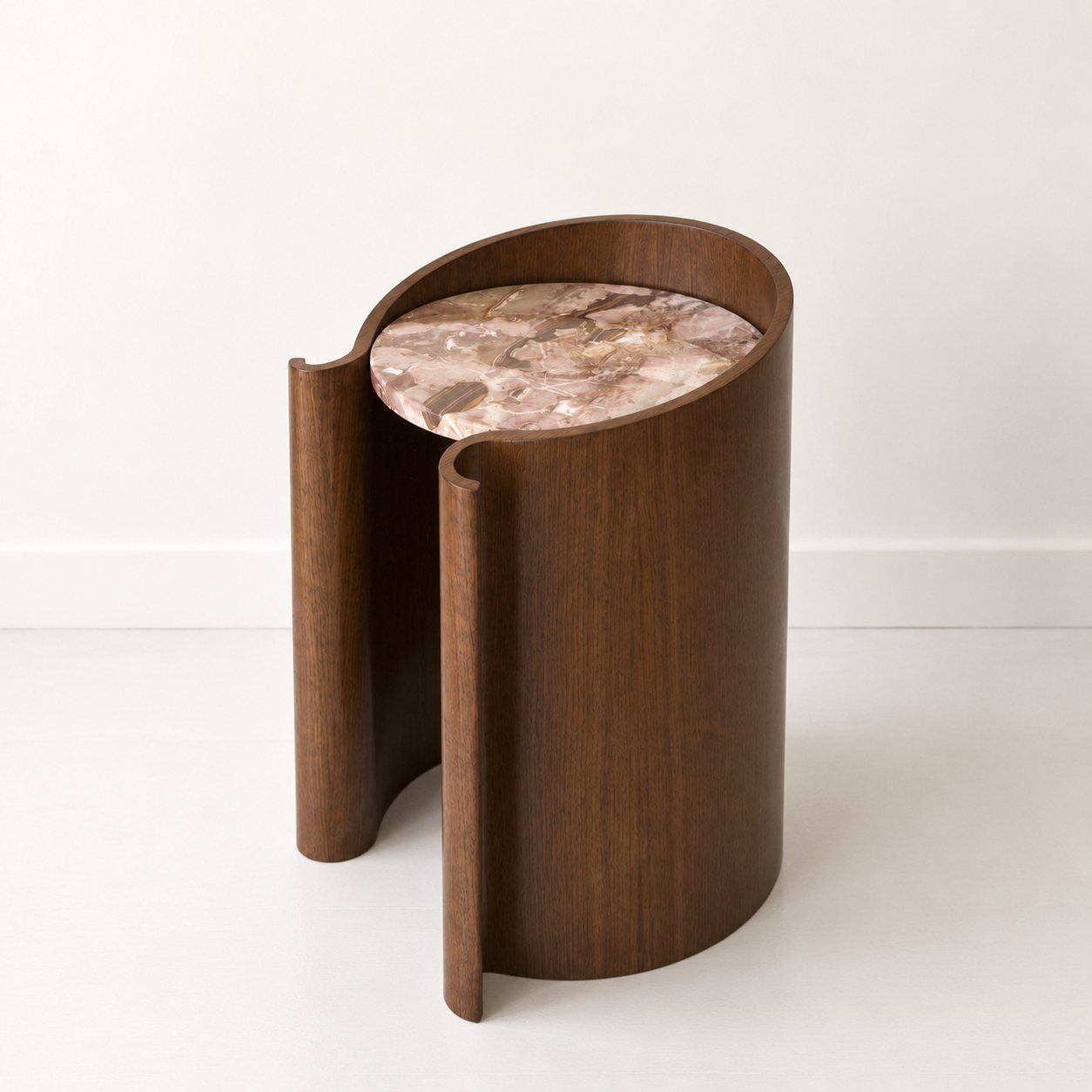 curved wood veneer side table in walnut with a marble top