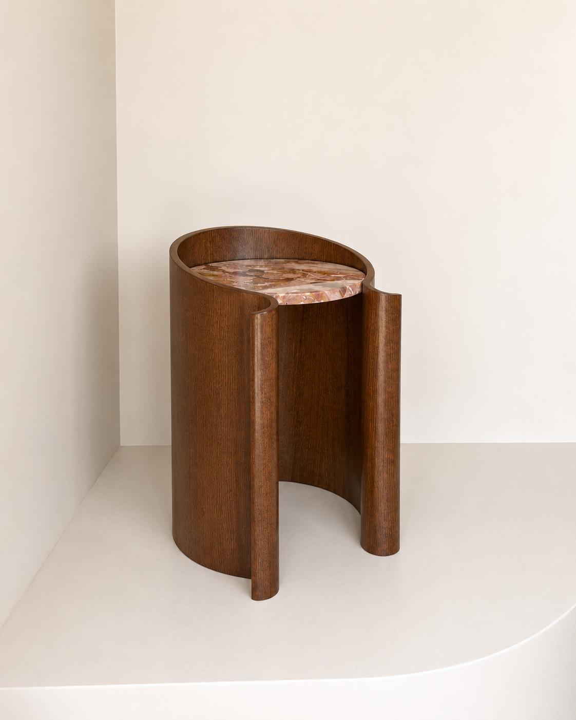 curved wood veneer side table in walnut with a marble top